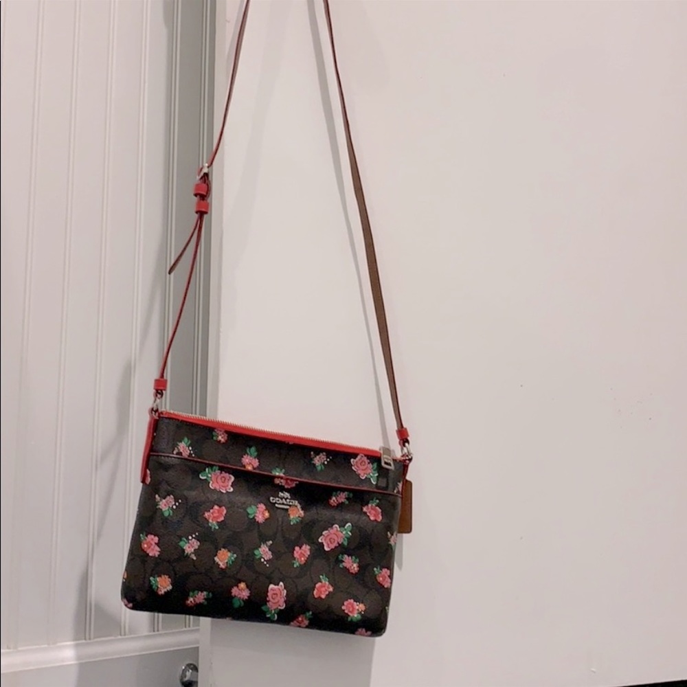 Coach purse with roses.